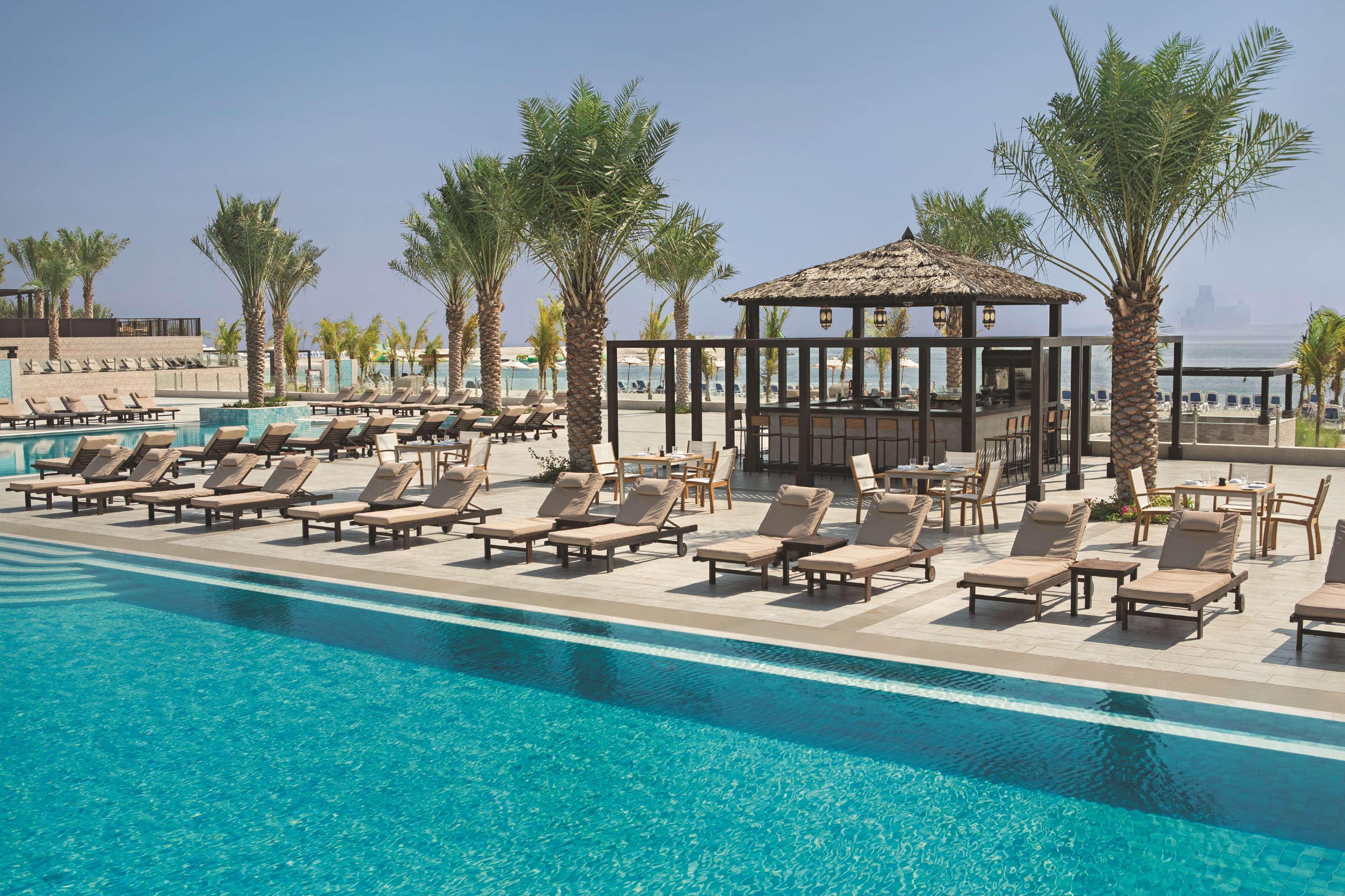 Doubletree By Hilton Resort & Spa Marjan Island Ras al-Khaimah Exterior photo The pool at the resort