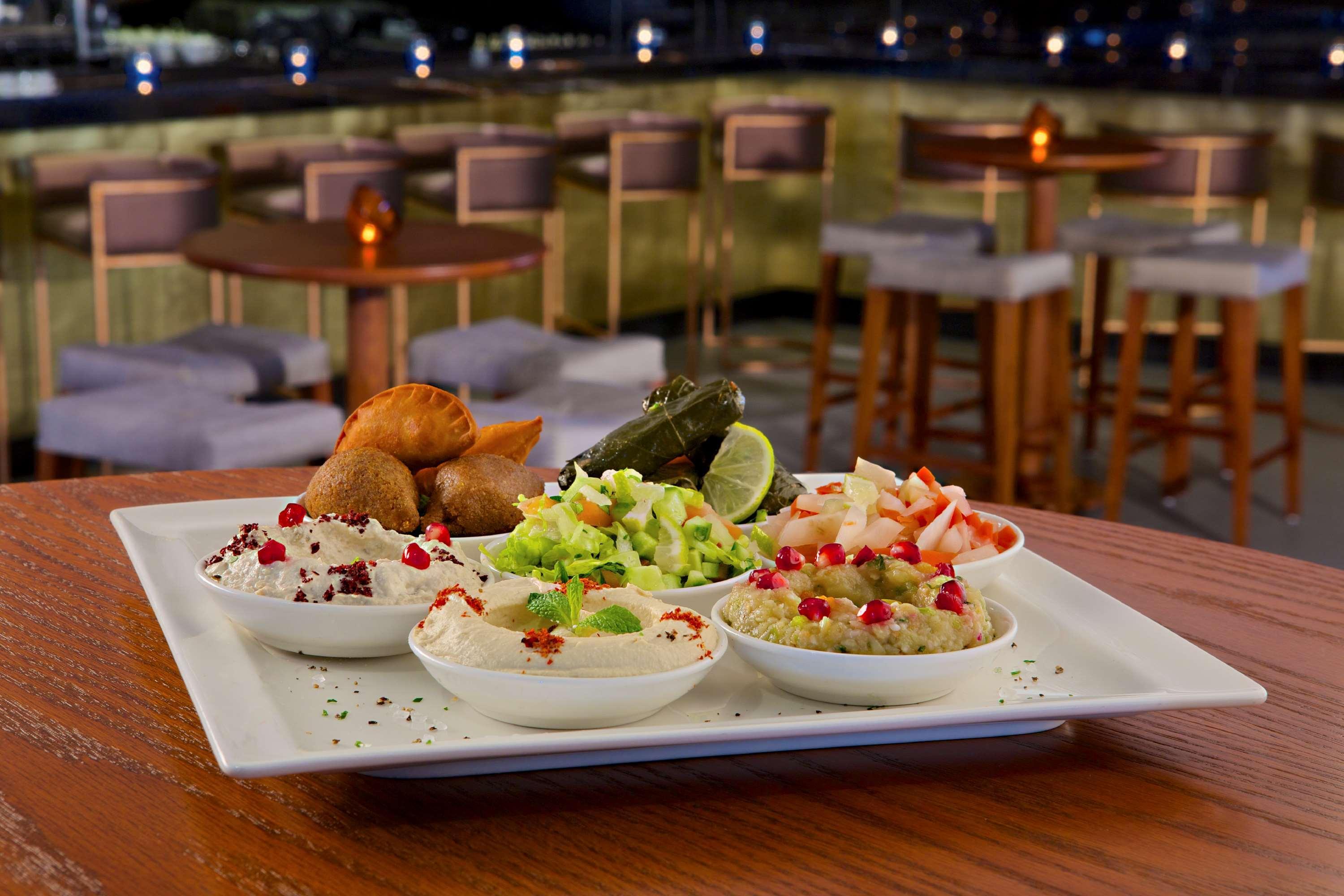 Doubletree By Hilton Resort & Spa Marjan Island Ras al-Khaimah Exterior photo Meze