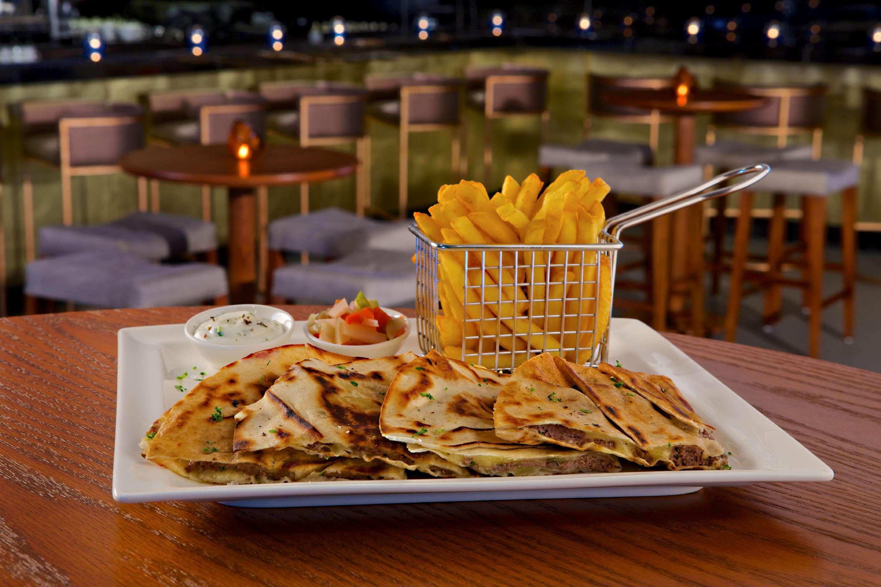 Doubletree By Hilton Resort & Spa Marjan Island Ras al-Khaimah Exterior photo A plate of quesadillas